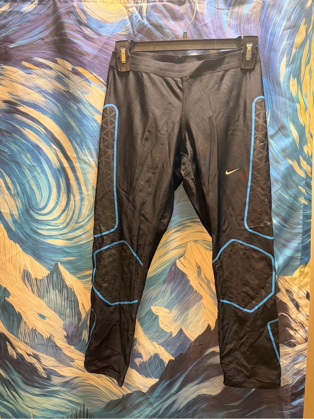 Nike Black Leggings with Bright Blue Zipper Accent